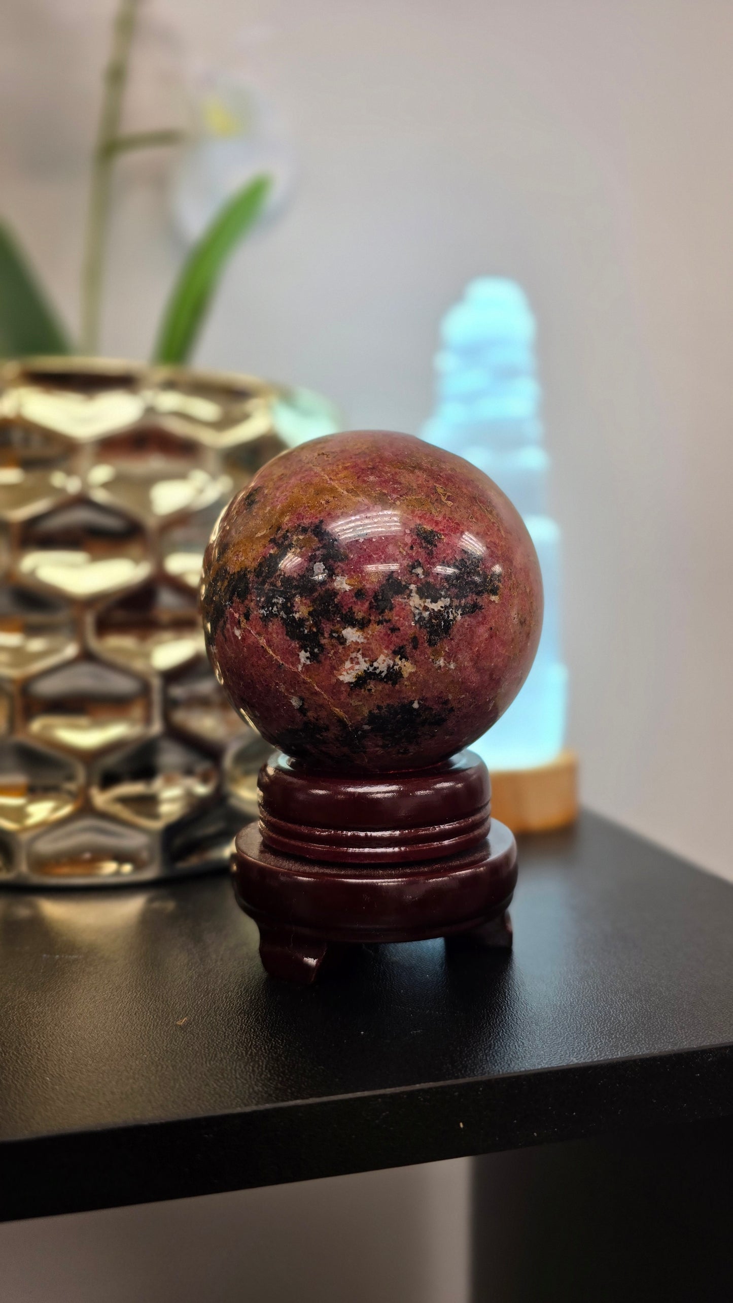 Rhodonite Sphere with wood Stand