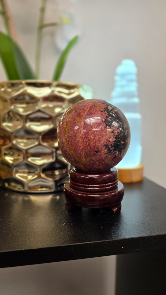 Rhodonite Sphere with wood Stand