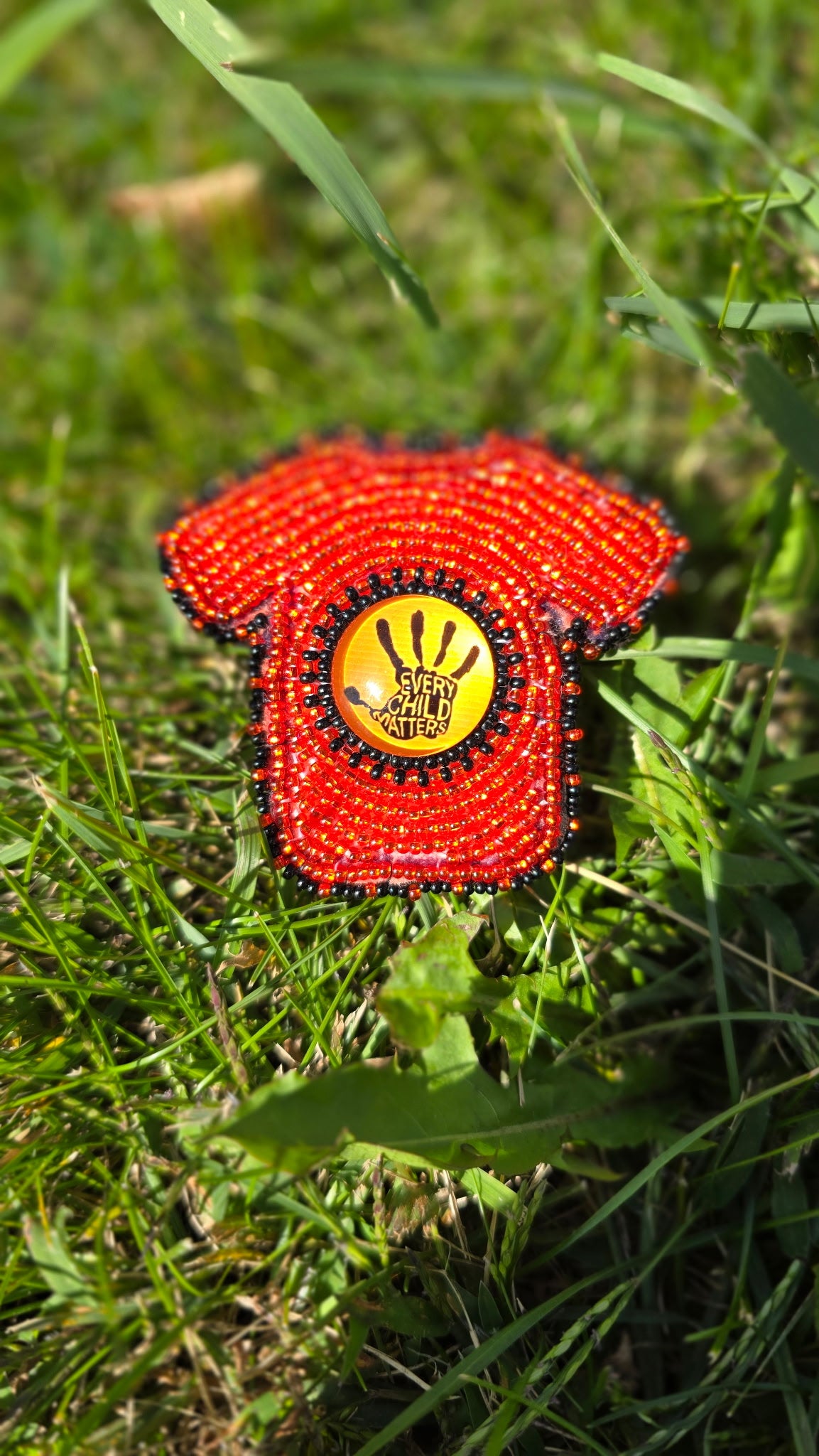 Beaded Every Child Matters Pin with Handprint centrepiece - Aligned Creations by Jess